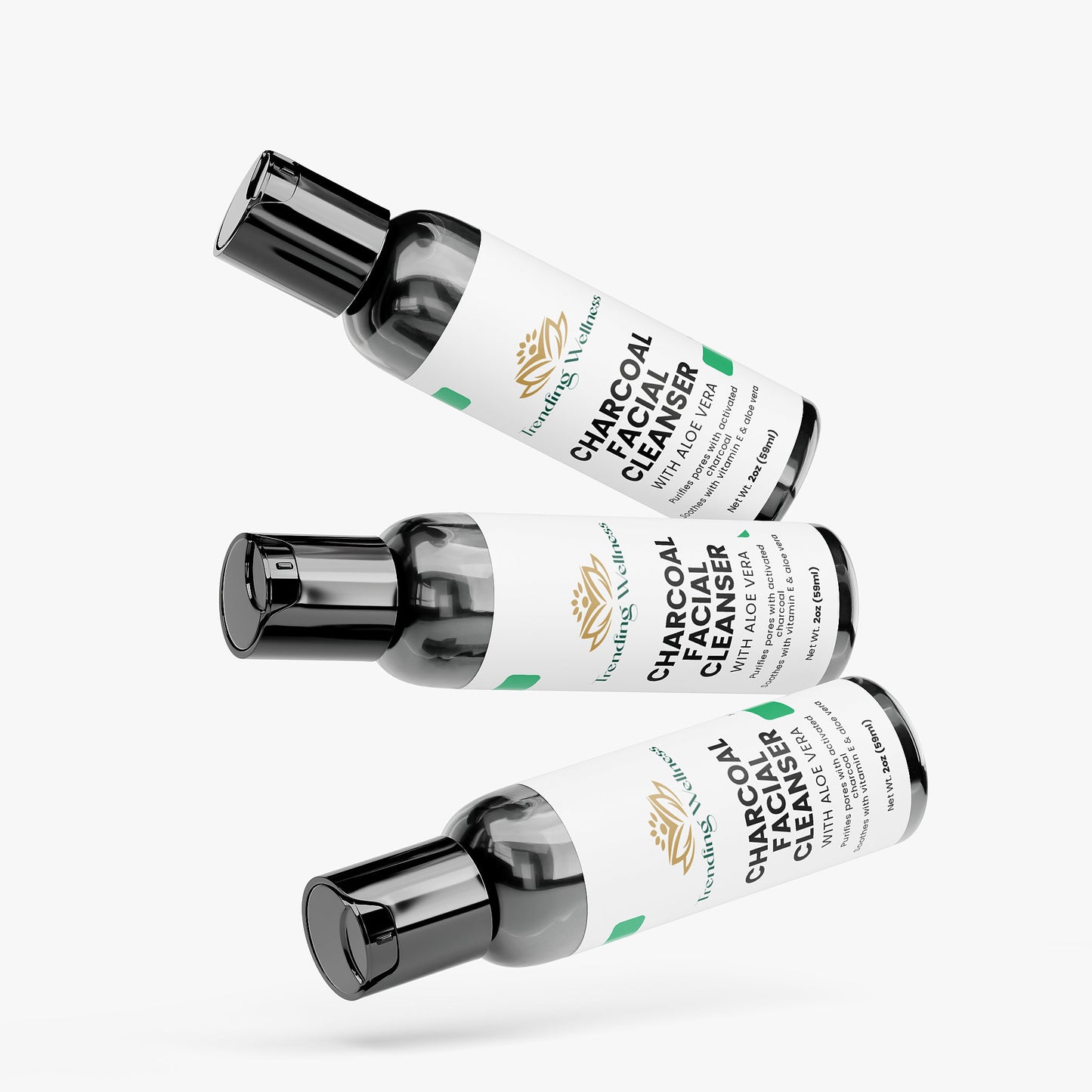 Three bottles of 'Mineralic' Purifying Charcoal Cleanser on a white background