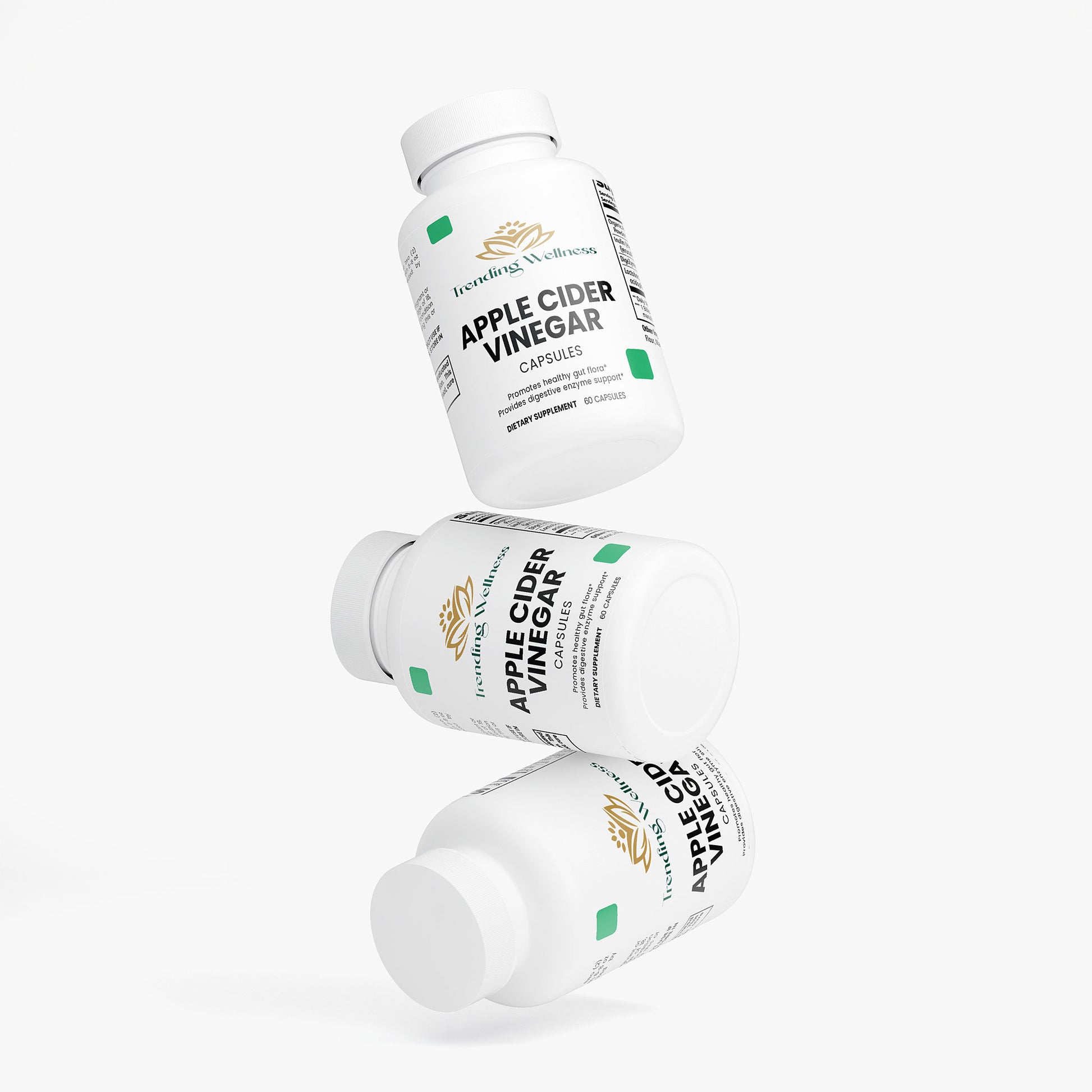 Three bottles of Apple Cider Vinegar capsules on a white background