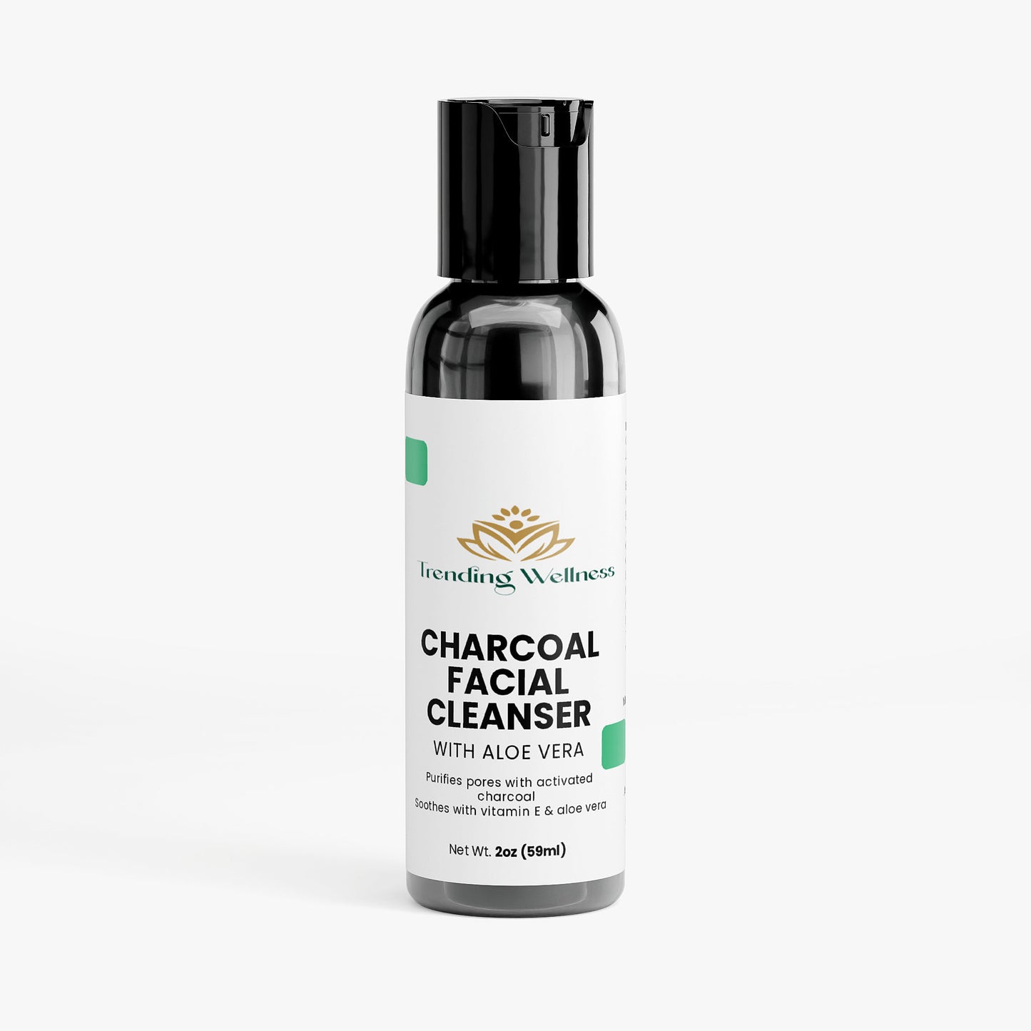 Bottle of charcoal facial cleanser with aloe vera on a white background
