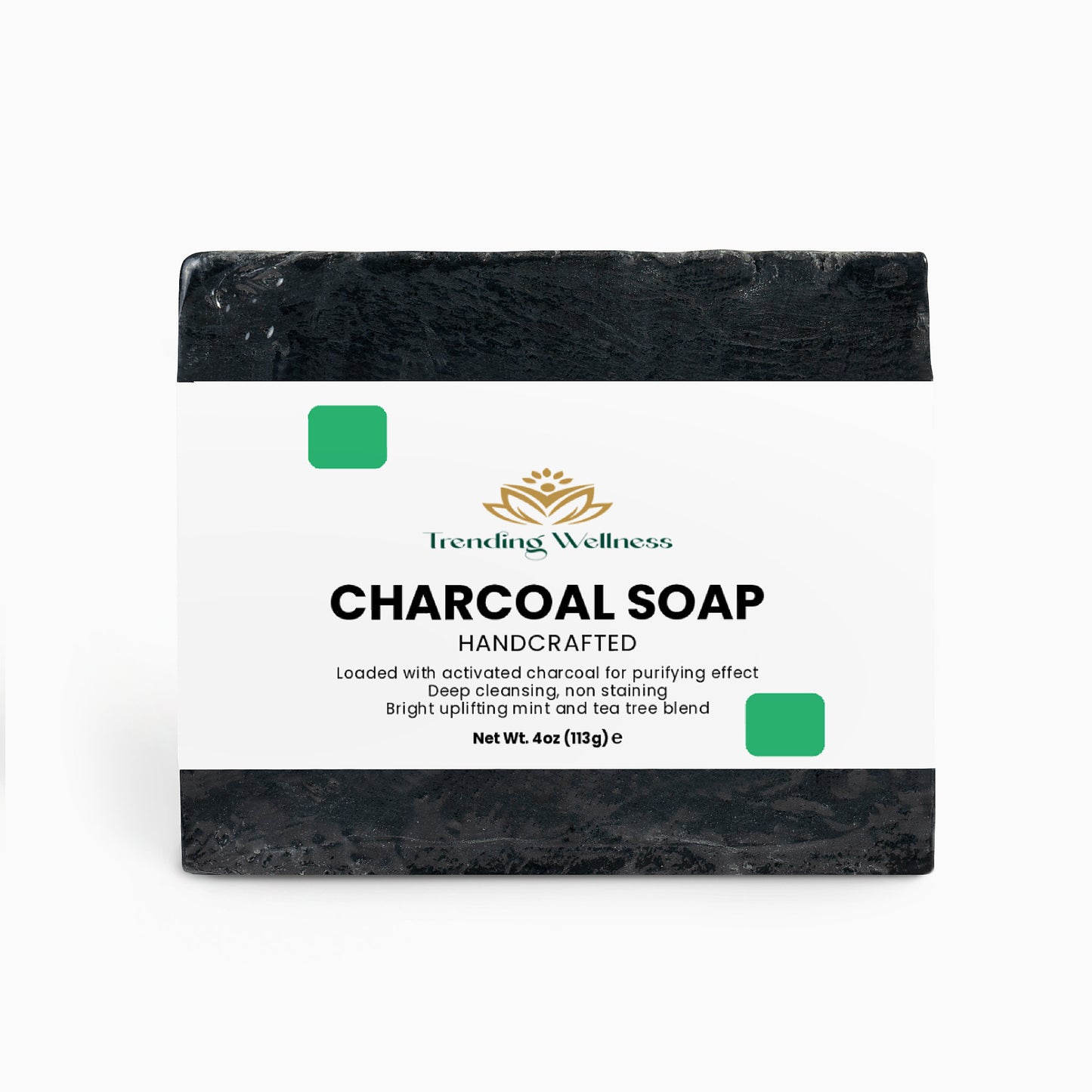 Bar of charcoal soap with a label on a white background