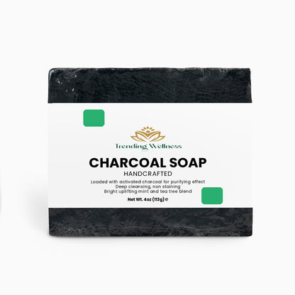 Bar of charcoal soap with a label on a white background