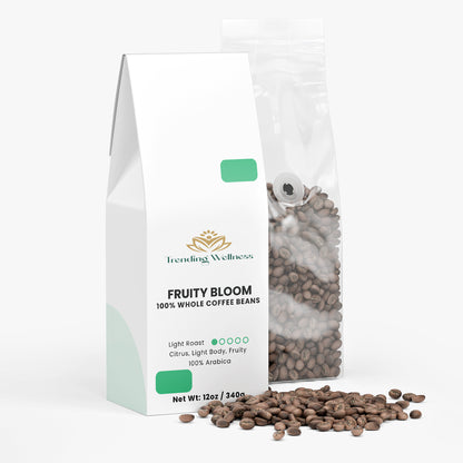 Packaging of Trending Wellness Fruity Bloom coffee beans with visible coffee beans on a white background