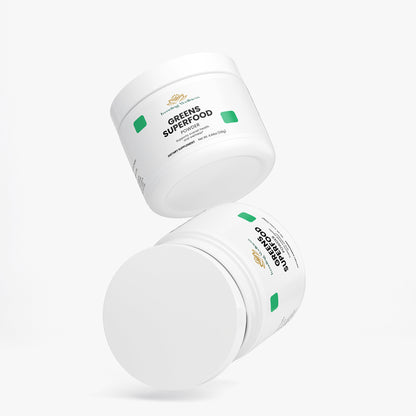 Two containers of 'Green Superfood' powder on a white background