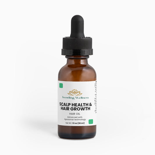 Bottle of scalp health and hair growth hair oil with a dropper on a white background