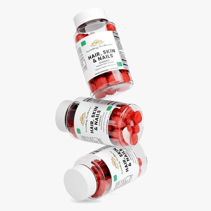 Three bottles of hair, skin, and nails supplements on a white background