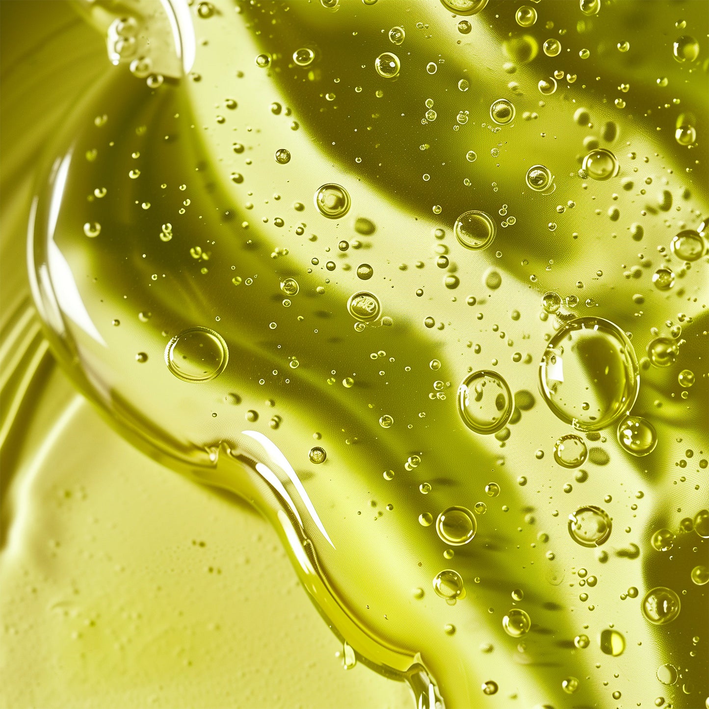 Close-up of yellow liquid with bubbles