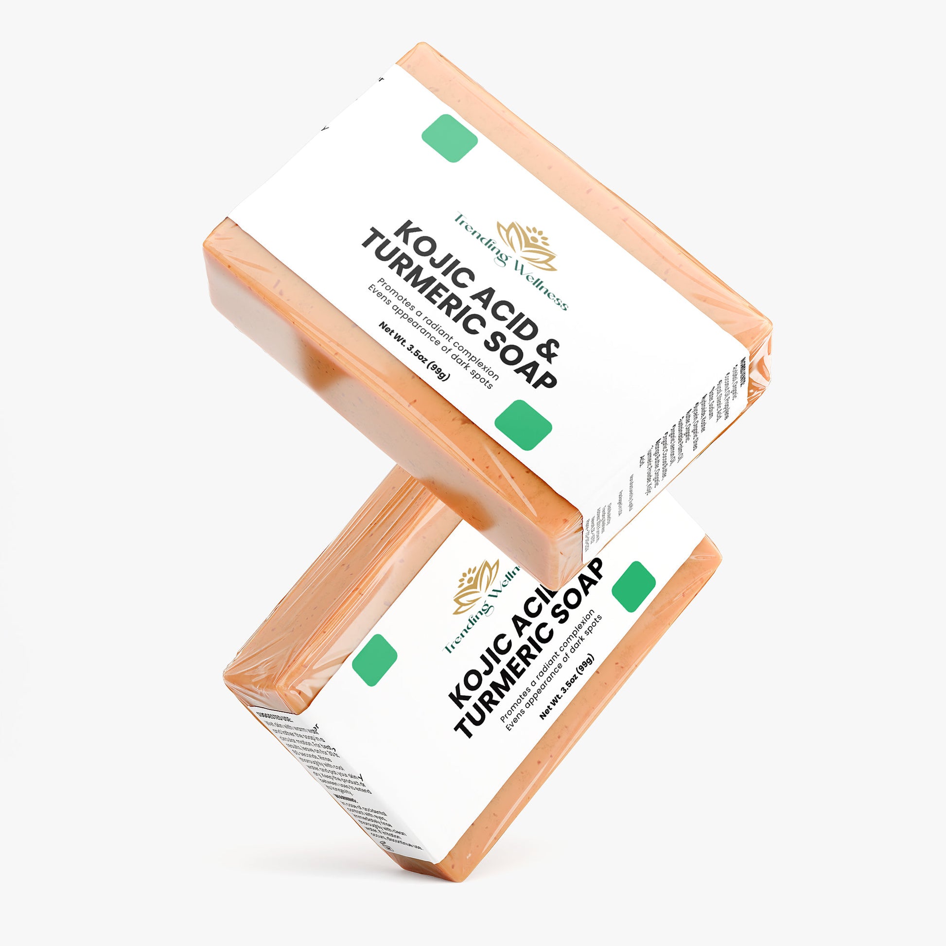 Two bars of Kojic Acid & Turmeric Soap on a white background