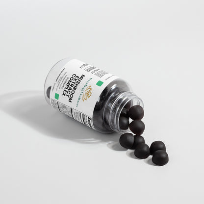 Bottle of black cohosh root pills with visible label on a light gray background