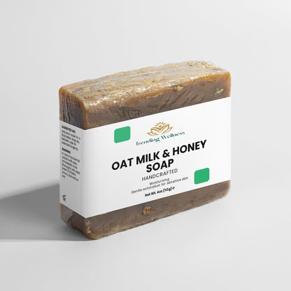 Oat milk and honey soap bar with a label on a light gray background