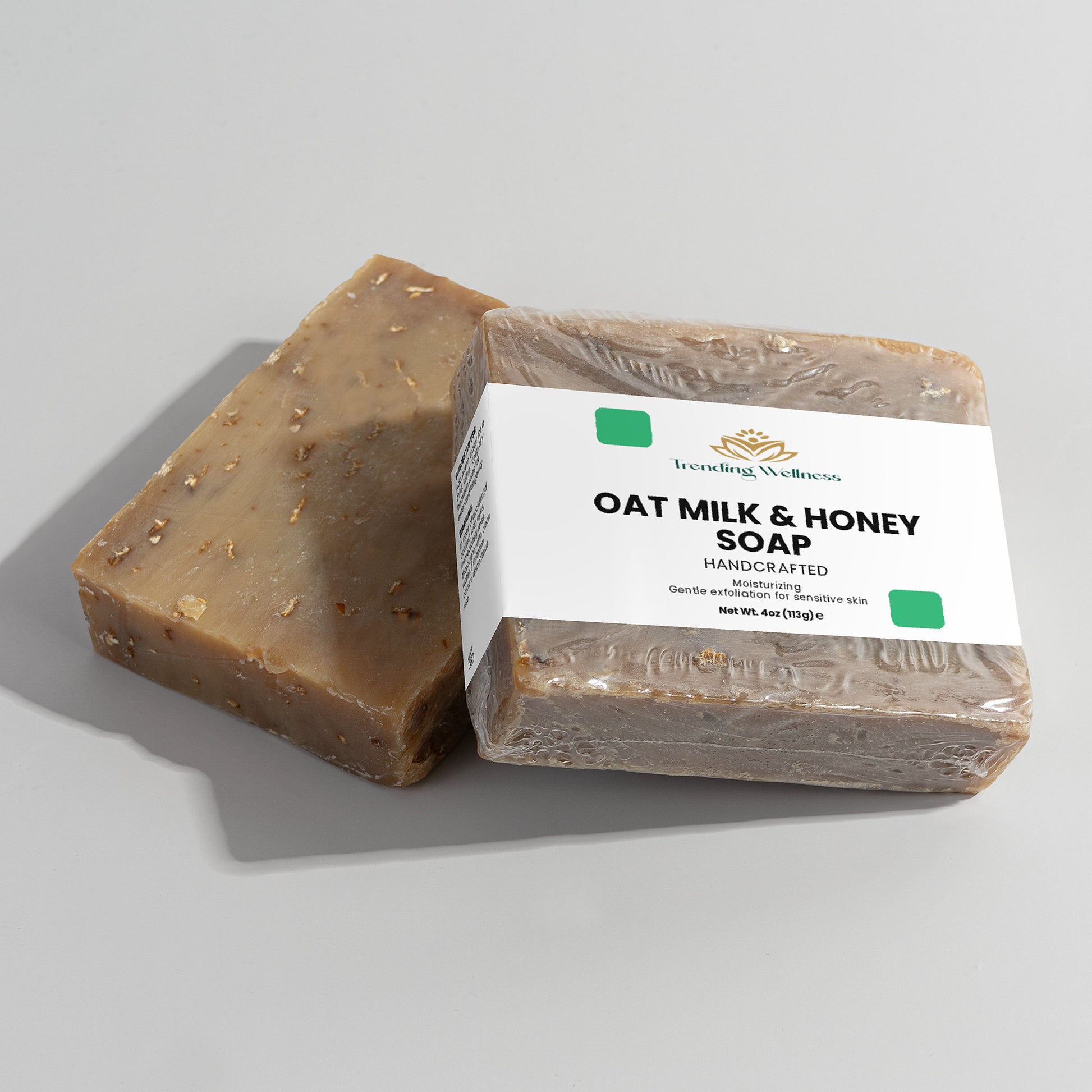 Oat milk and honey soap with a label on a gray background
