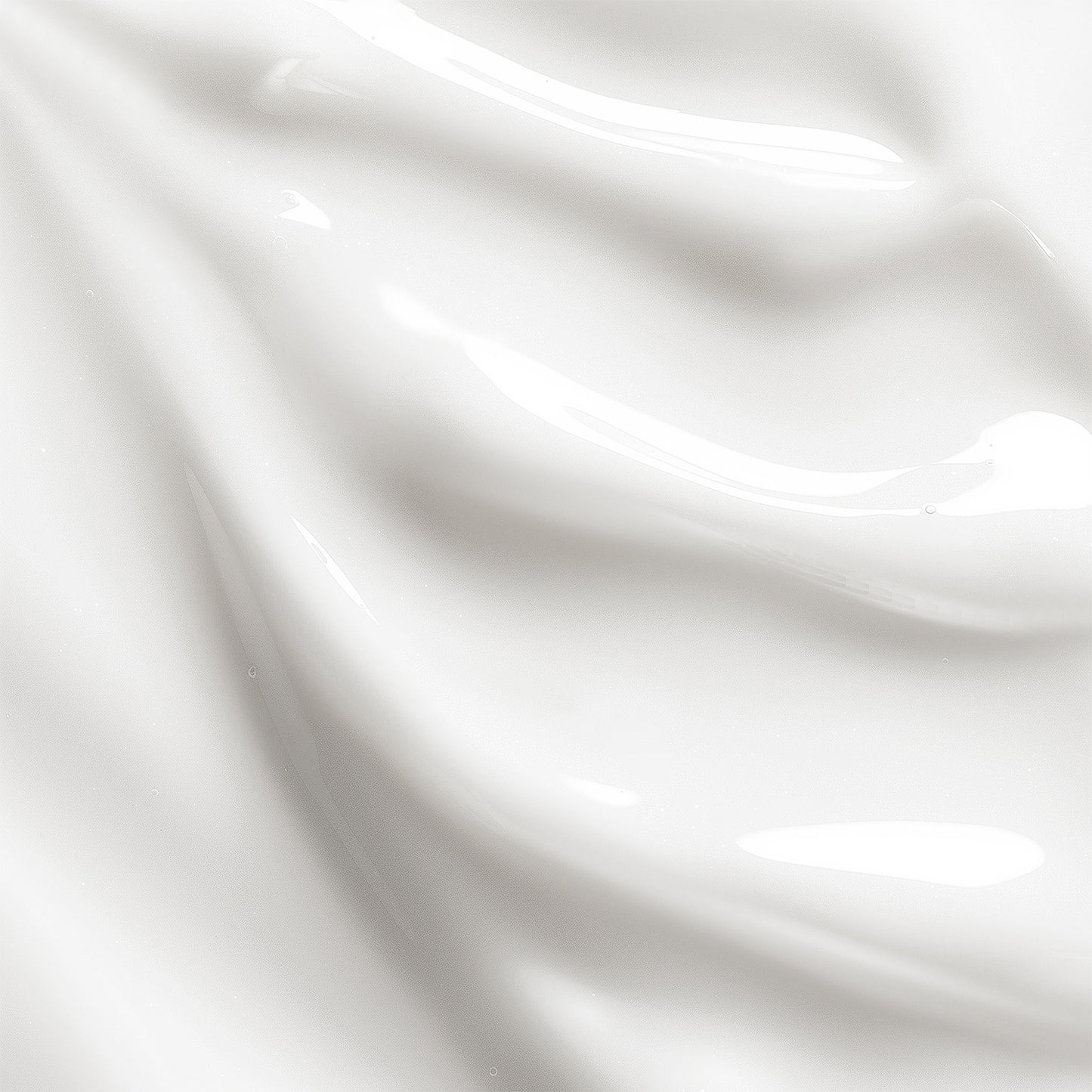 Close-up of white satin fabric with folds