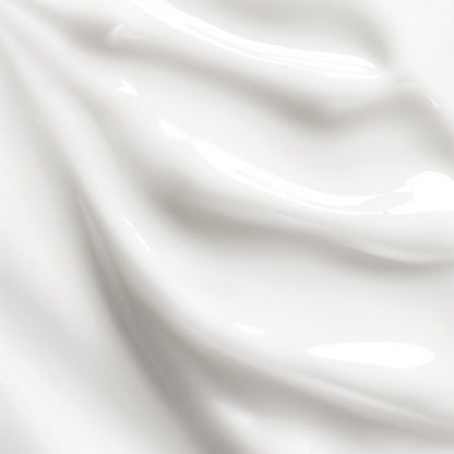 Close-up of white satin fabric with folds