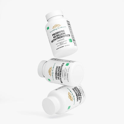 Three bottles of probiotic and prebiotic supplement on a white background