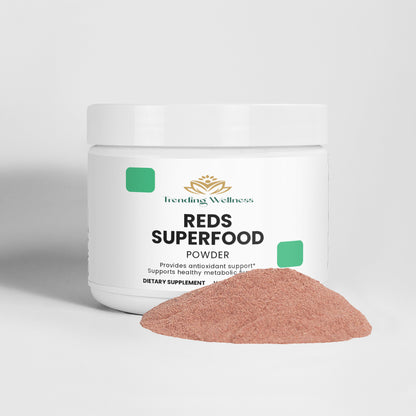 Jar of Trending Wellness Reds Superfood Powder on a light gray background