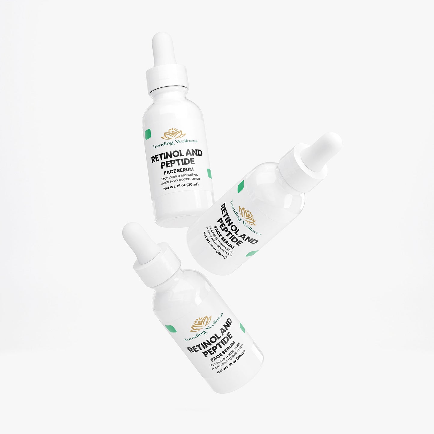 Three bottles of Retinol and Peptide face serum on a white background