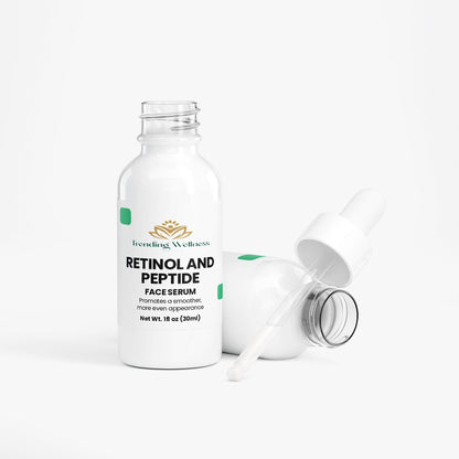 Retinol and peptide face serum bottle with dropper on a white background