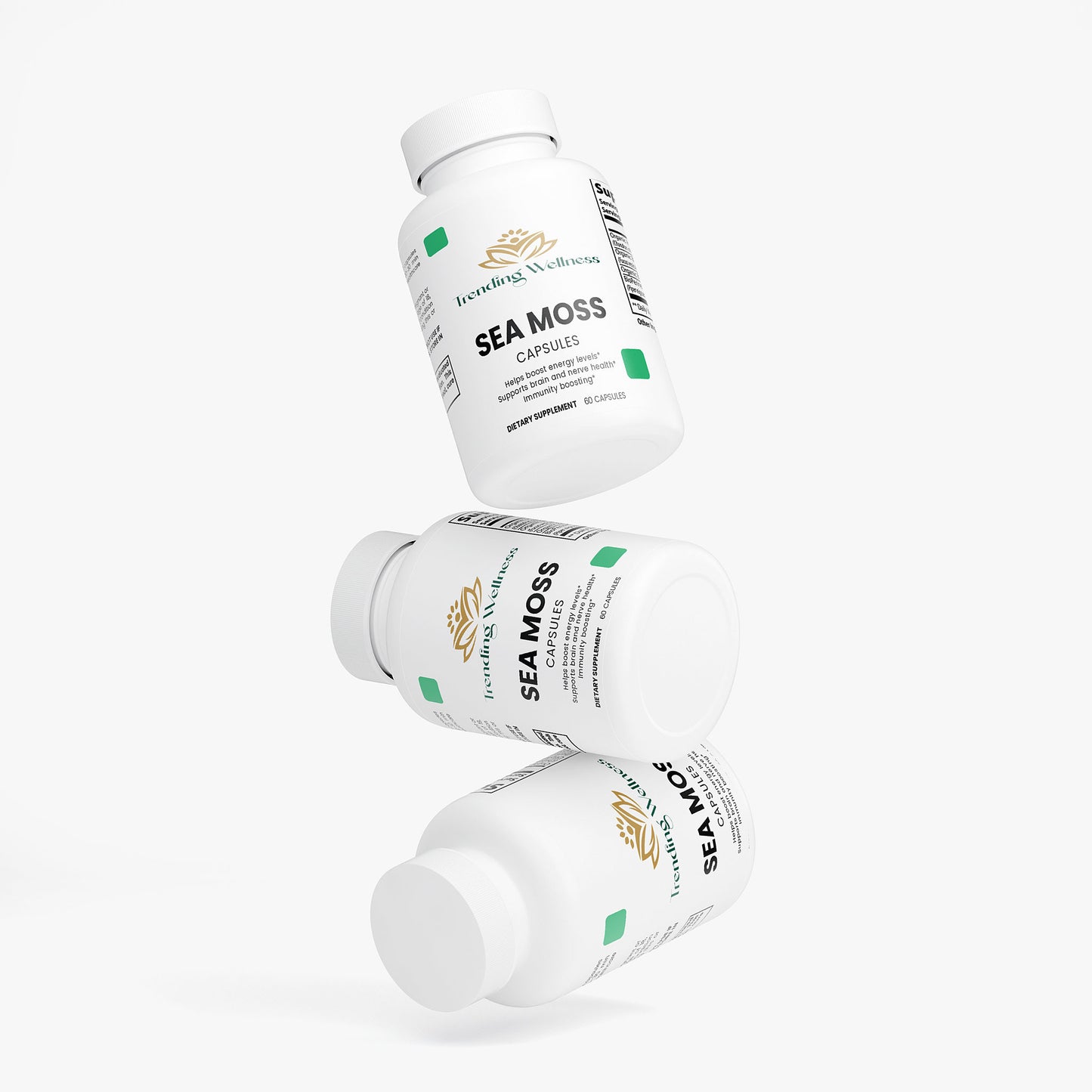 Three bottles of Sea Moss capsules on a white background