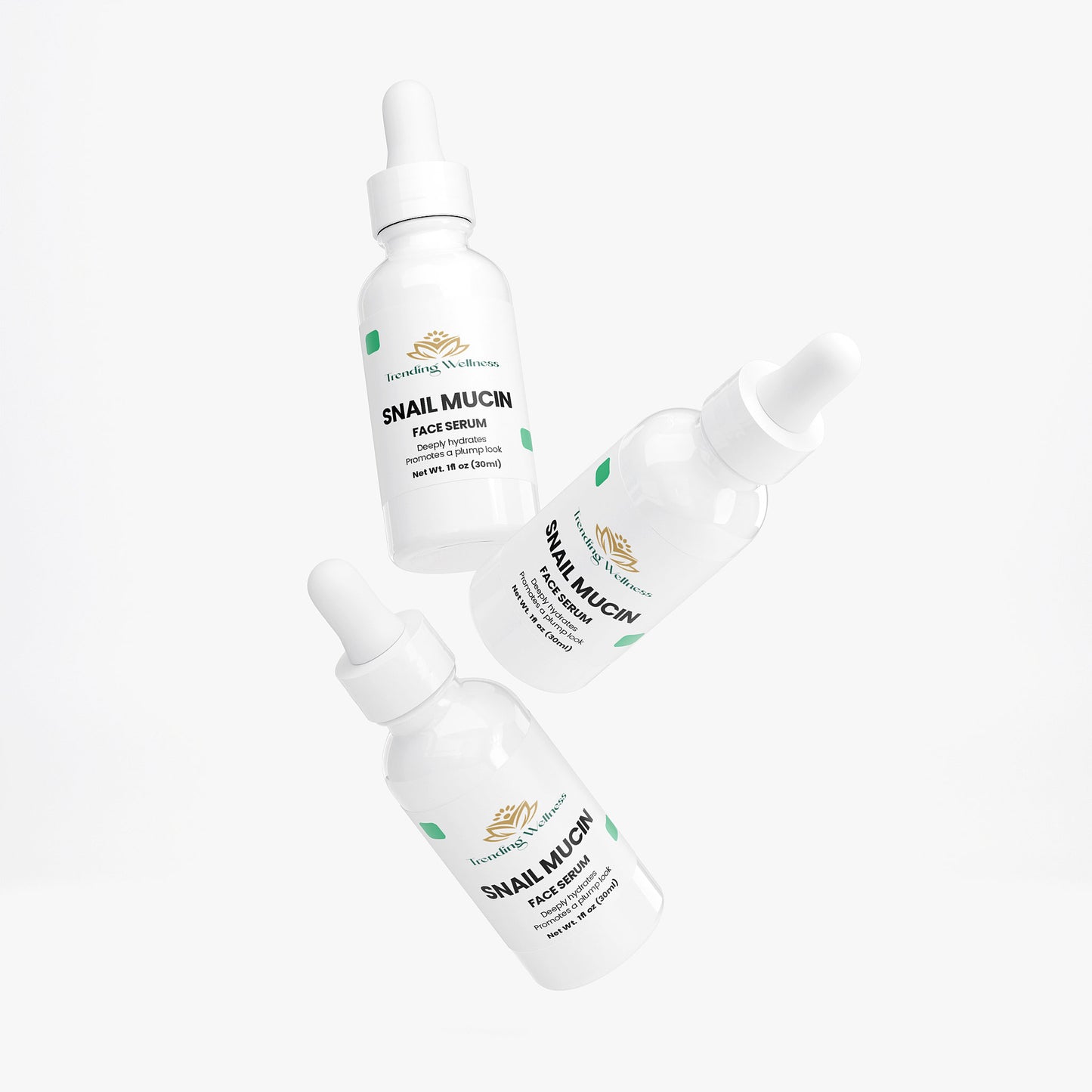 Three bottles of Snail Mucin Face Serum on a white background