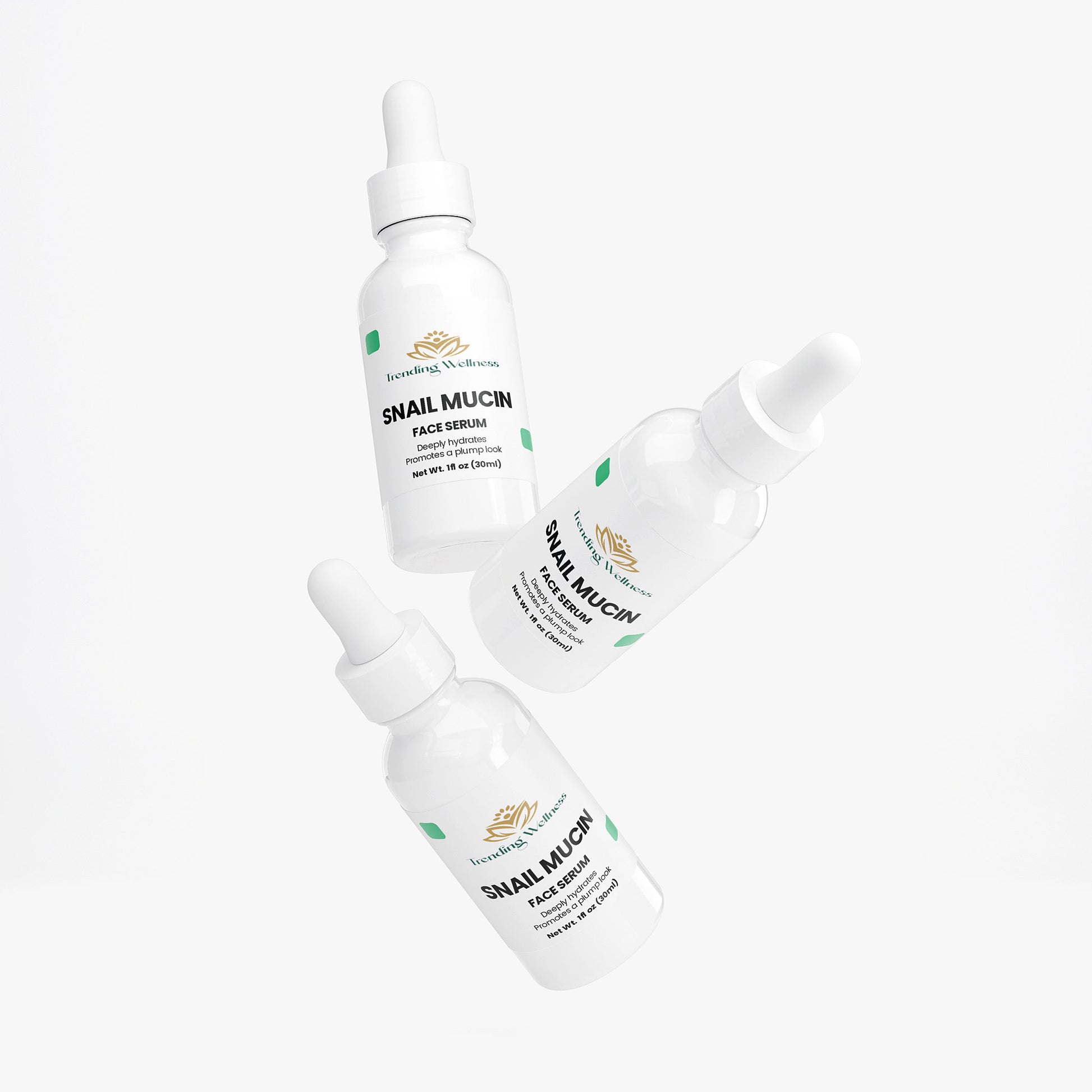Three bottles of Snail Mucin Face Serum on a white background