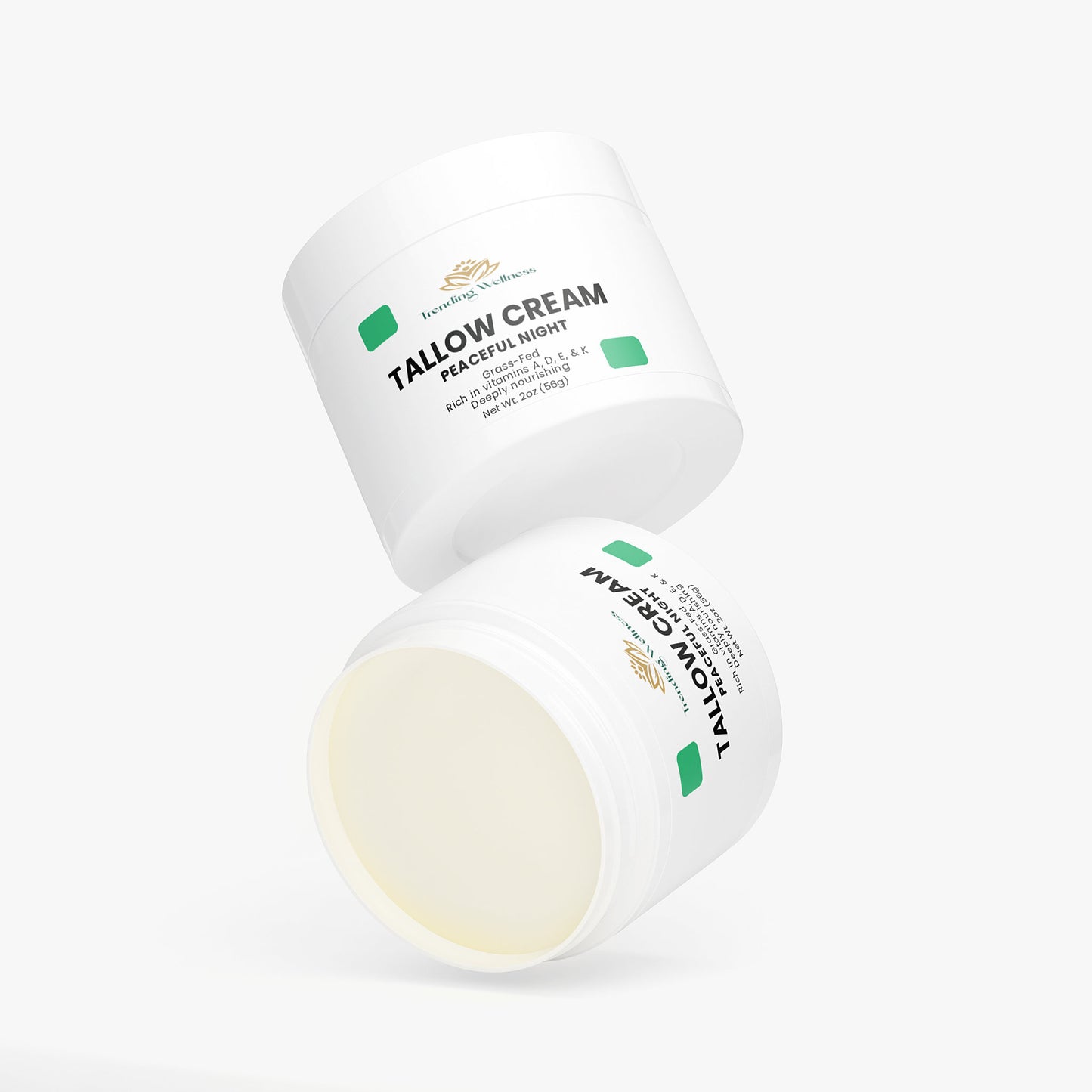 Two containers of tallow cream on a white background